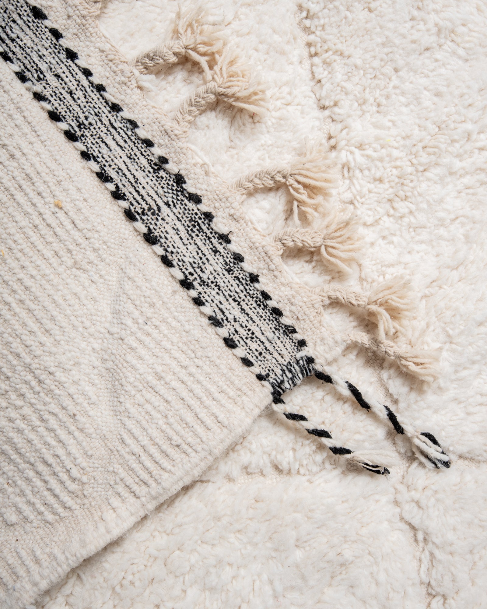 Modern, designer, handcrafted Berber rug from Morocco. Beniourain carpet with beautiful colours and patterns and fluffy wool texture.
